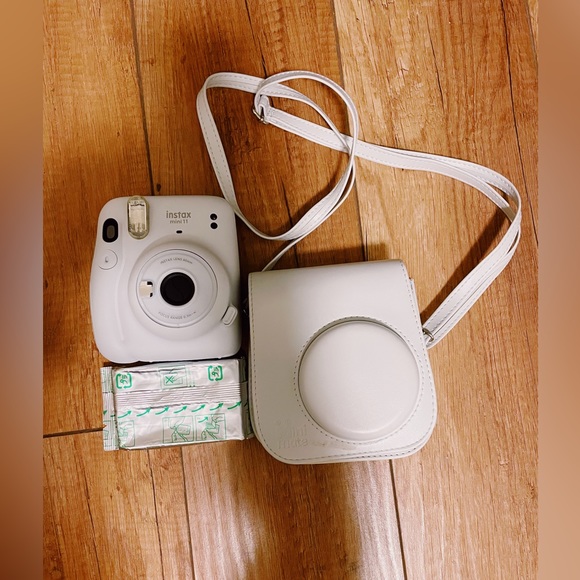 Other - Instax mini with film and a cute holder! A great bday gift!